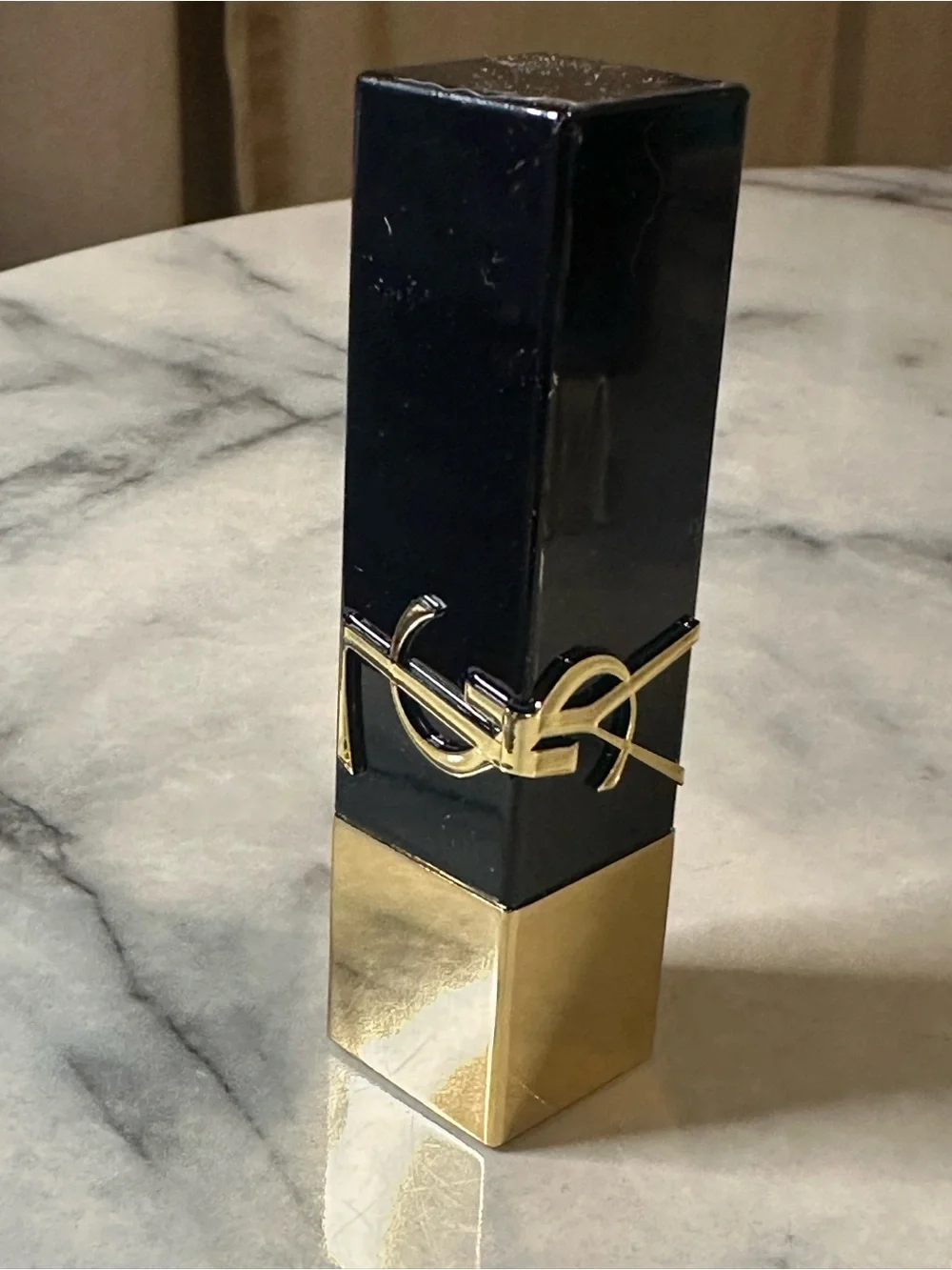 Yves Saint Laurent Gold & Black Tube Lipstick — Bright Red color “Wilful Red.”